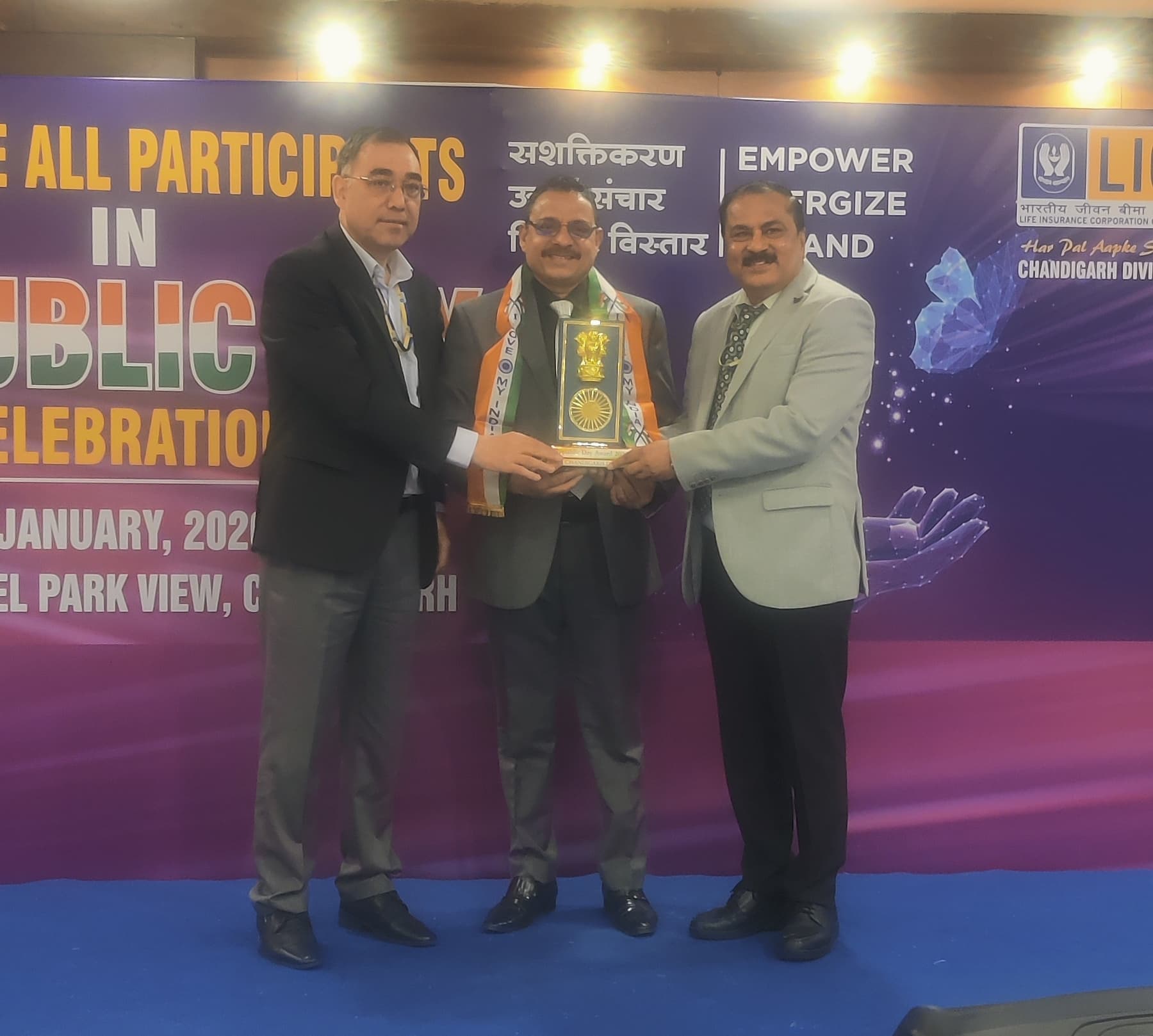 Team members in professional achievement celebration